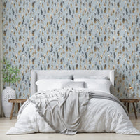 Silver and gold feather pattern on soft backdrop

