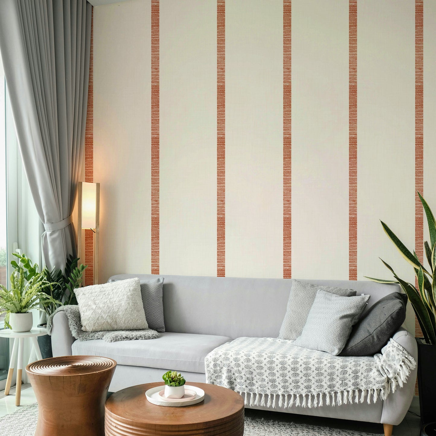 Warm boho wallpaper featuring golden stripes and terracotta hues

