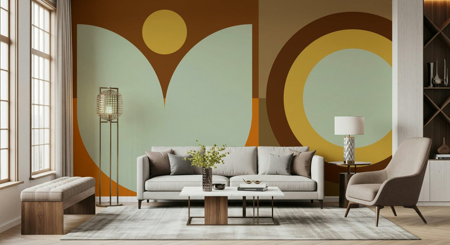 Boho Sun and Moon wallpaper mural in rust and sage behind a cream sofa and gold floor lamp in a bright living room