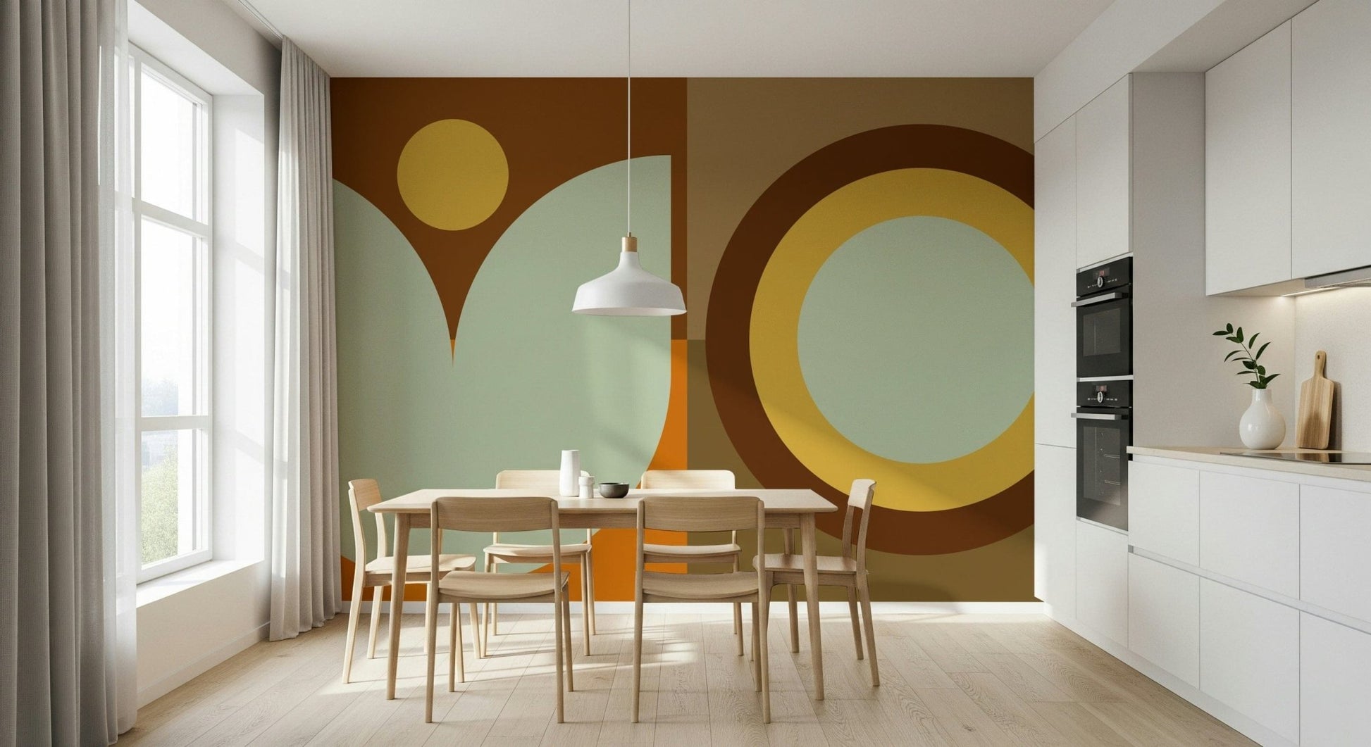 Boho Sun and Moon wallpaper mural with rust circles and sage shapes in a dining room with wood chairs and white cabinets