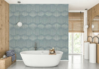 Boho Waves On Arona Canvas wallpaper in blue-grey behind a white freestanding bathtub with wood walls and bamboo blind