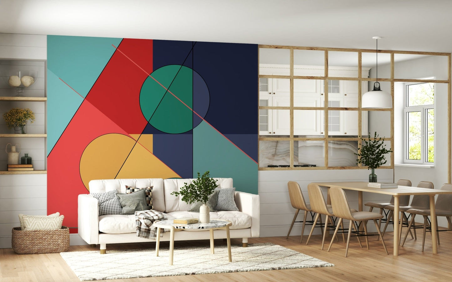 Bold Bauhaus wallpaper mural of geometric shapes behind a white sofa beside a wood dining table