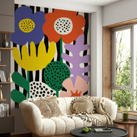 Matisse-style floral collage mural in a studio space


