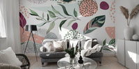 Muted pastel floral wall mural showing overlapping leaf patterns.