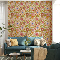 Watercolor plant print wallpaper in muted hues

