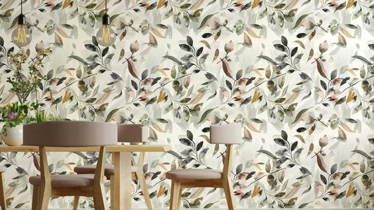 Botanical Leaf Watercolor wallpaper in sage and brown behind a round dining table with wooden chairs and bulb pendants