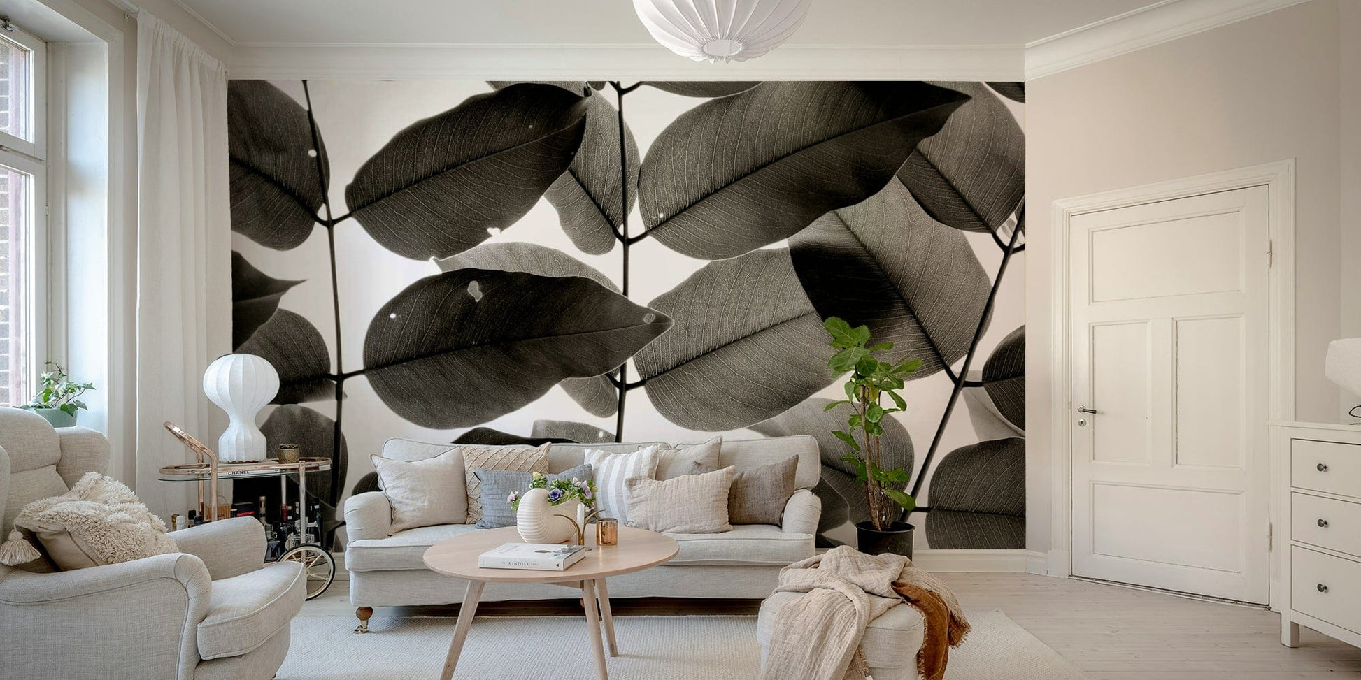 An artistic leaf pattern mural on minimalist wallpaper.

