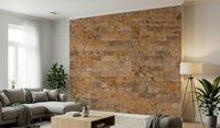 Brickwork Beauty wallpaper mural as a tan brick feature wall behind a gray sofa and tripod floor lamp