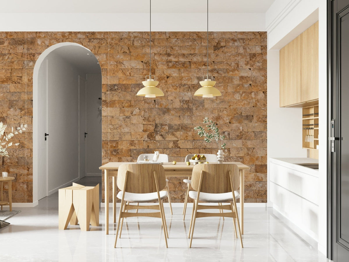 Brickwork Beauty wallpaper mural in tan stone beside an arched doorway in a bright wood-toned dining room