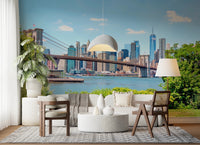 Bridge to Manhattan wall mural of the Brooklyn Bridge skyline behind a white boucle sofa and terrazzo table