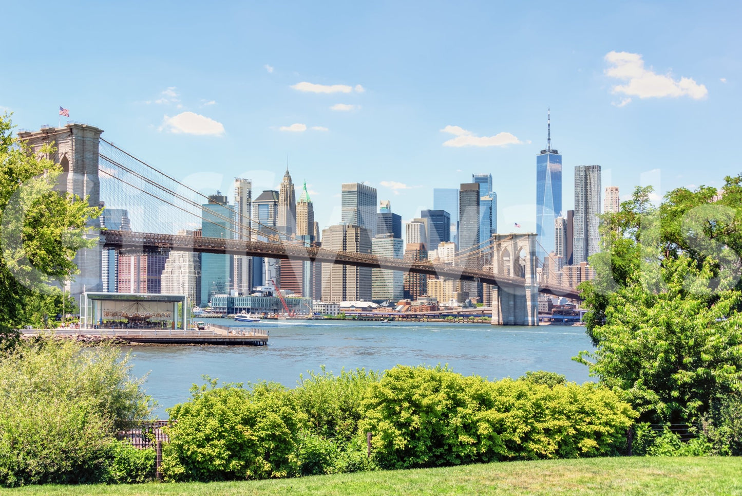 Bridge to Manhattan wall mural shown full-wall: the Brooklyn Bridge spanning blue water before the Manhattan skyline