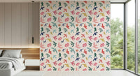Bright Freedom Birds wallpaper of colorful flying birds behind a low white bed in a bedroom