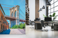 Brooklyn Bridge Vista wallpaper mural of the bridge and brick building beside grey desks and chairs in a home office