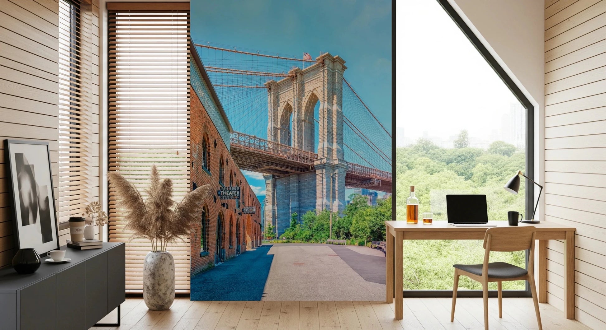 Brooklyn Bridge Vista wallpaper mural with the bridge and brick building behind a wood desk and laptop in a home office