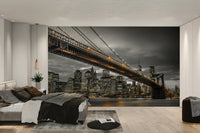 Manhattan cityscape mural with illuminated bridge

