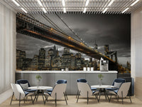 Urban wall mural of bridge and New York skyscrapers

