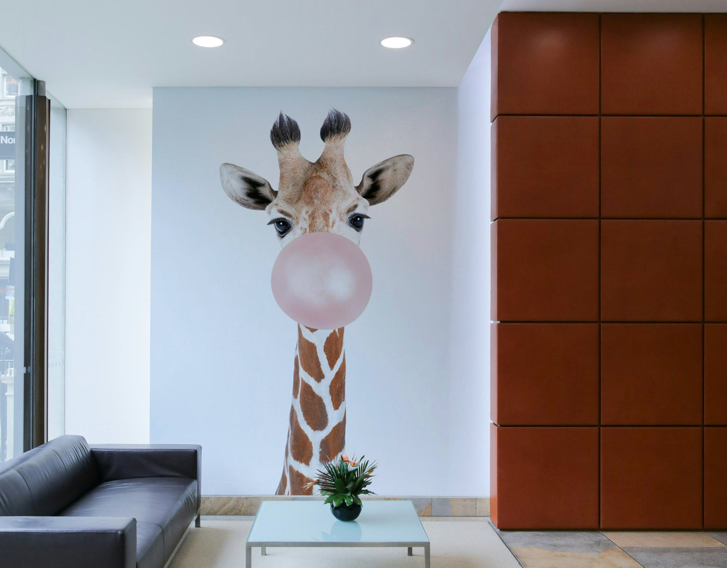 Cute giraffe with bubble gum in vibrant mural design for decor.

