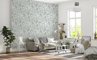 Butterfly Bloom Line Art wallpaper in a bright Scandinavian living room with beige sofa and striped rug