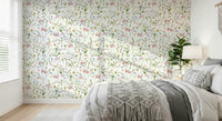 Pastel butterflies flitting through meadow florals. Wall covering.