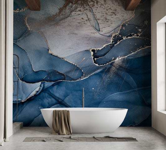 Blue Alcohol Ink Colors wallpaper mural in navy and gold behind a white freestanding bath on a concrete floor