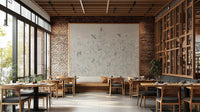 Enchanted Aviary Ballet mural framed on a brick wall in a restaurant dining room with wooden tables