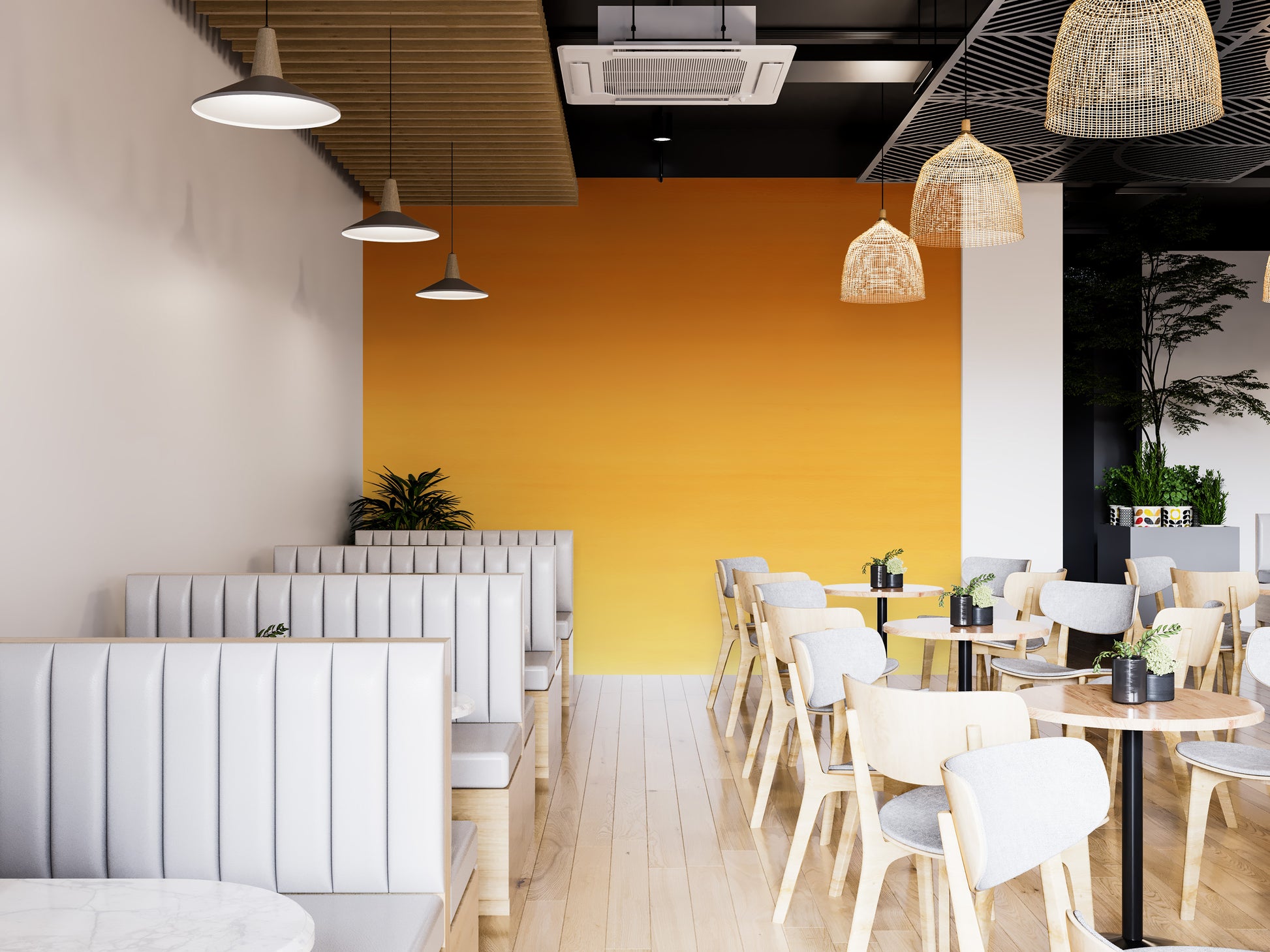 Honey Ombre wallpaper mural in golden tones behind white booths and wood cafe tables with rattan lights