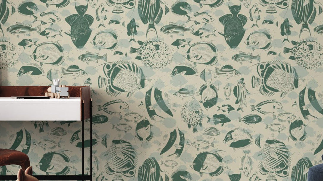 Marine Mosaic wallpaper mural with a green vintage pattern of fish and sea life on cream beside a white console