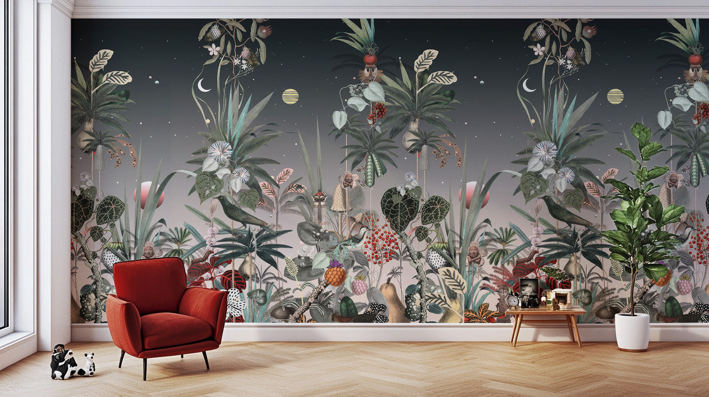 Midnight Botanic wall mural of dark moonlit tropical plants behind a red velvet armchair and potted fig in a living room