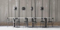Misty Pines Serenity wallpaper of grey foggy pines behind a long white dining table with metal pendant lights