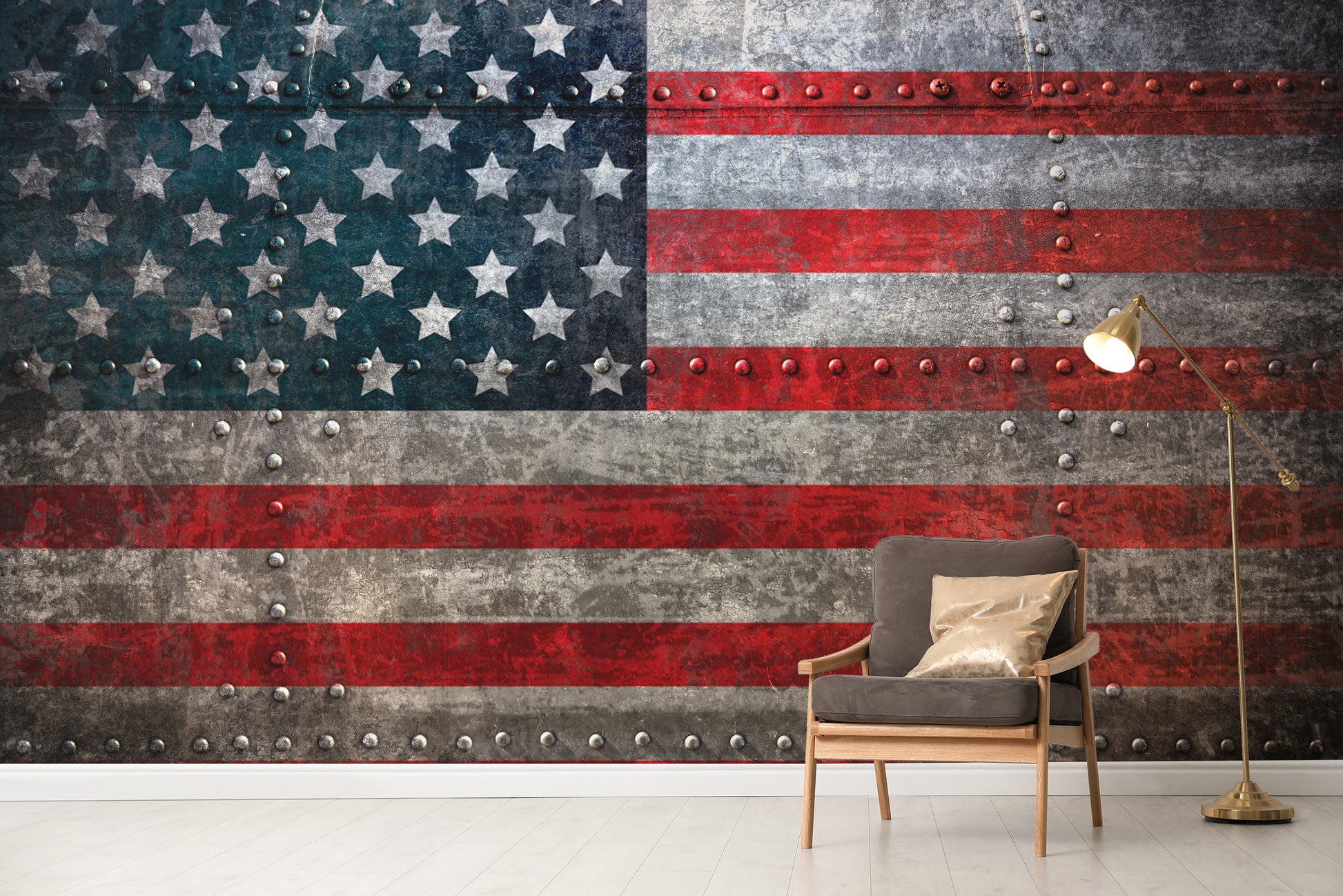 Self adhesive Rustic Steel American Flag Wall Mural in a lounge area with a grey armchair and floor lamp.