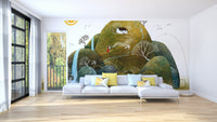 Serene Nature wallpaper mural of rolling green hills and a cottage behind a grey sofa with yellow cushions in a sunlit living room