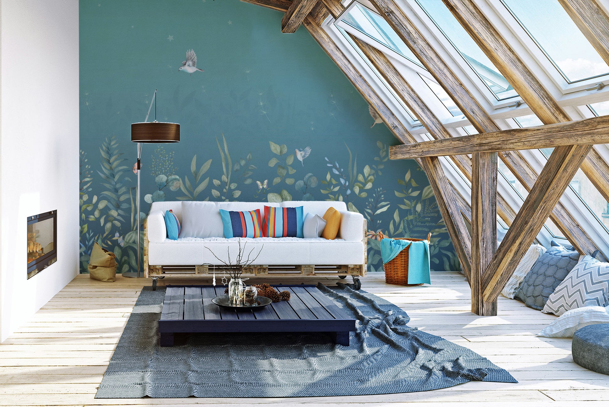 Twilight Flutters wallpaper mural of teal foliage and birds behind a white pallet sofa in a skylit attic lounge