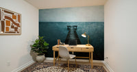 Pier's Edge Wall Mural in reading nook, light wood furniture, calm coastal scene