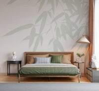 Elegant bamboo leaves cascading across a minimalist wallpaper for a peaceful modern look.