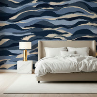 An artistic fluid pattern mural on minimalist wallpaper.