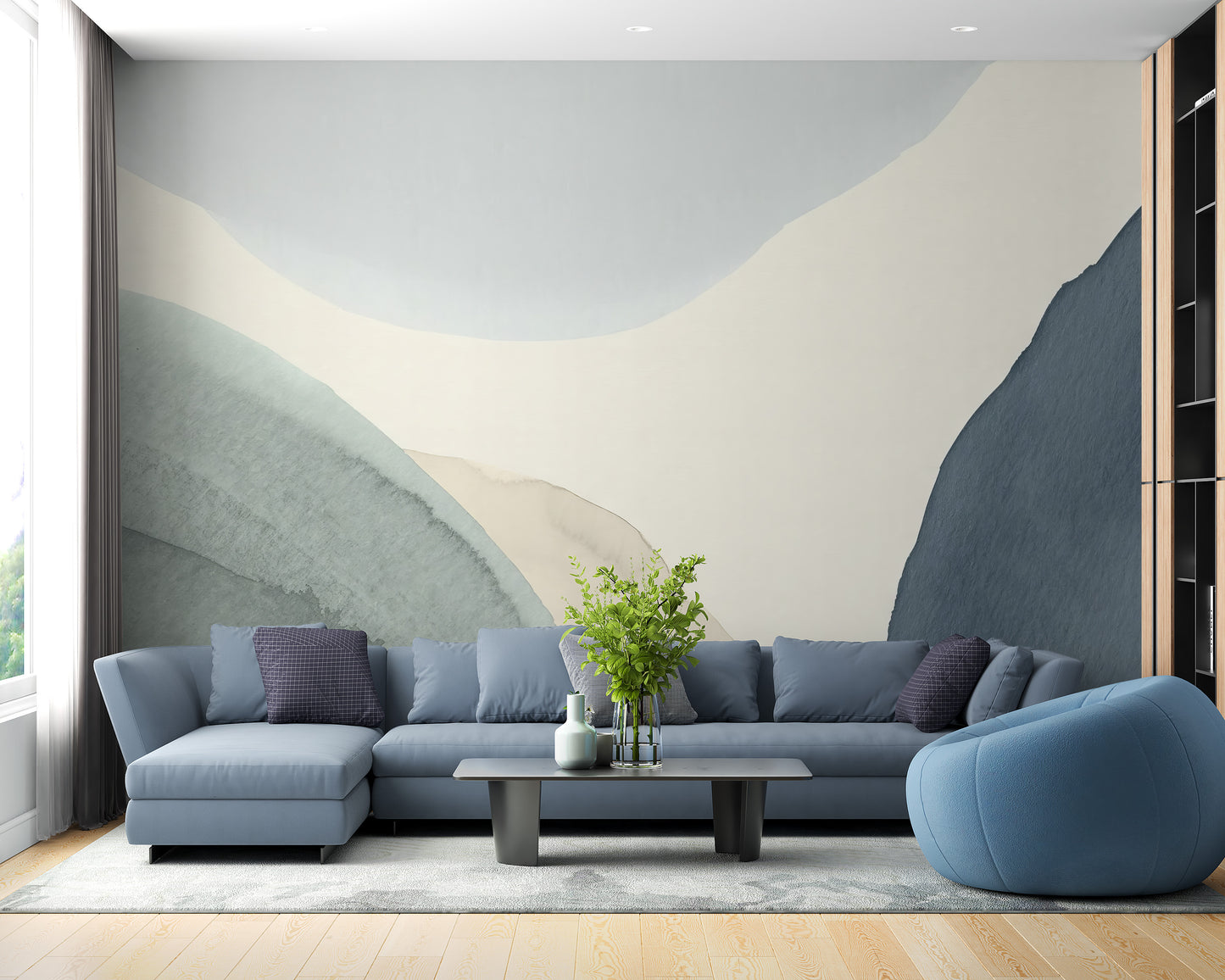 Calming Contours wallpaper mural of abstract blue and beige curves behind a blue sectional in a living room
