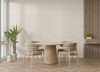 The design features a repeating pattern of soft, delicate tropical leaves.

