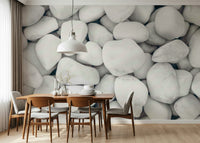 Minimalist pebble wall covering in crisp white tones for stylish, calming interiors.