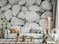 Pebble-inspired wall mural creating a calming, minimalist white stone effect.