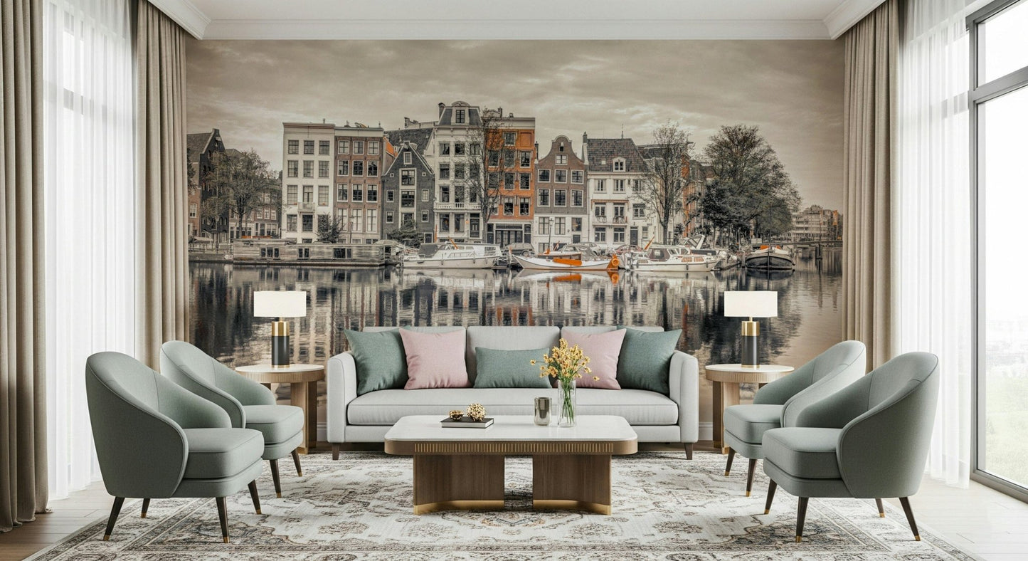 Canal Harmony wallpaper mural of sepia Amsterdam canal houses and boats behind a gray sofa and sage armchairs in a living room