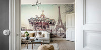 Whimsical Paris scene with carousel and Eiffel Tower mural.

