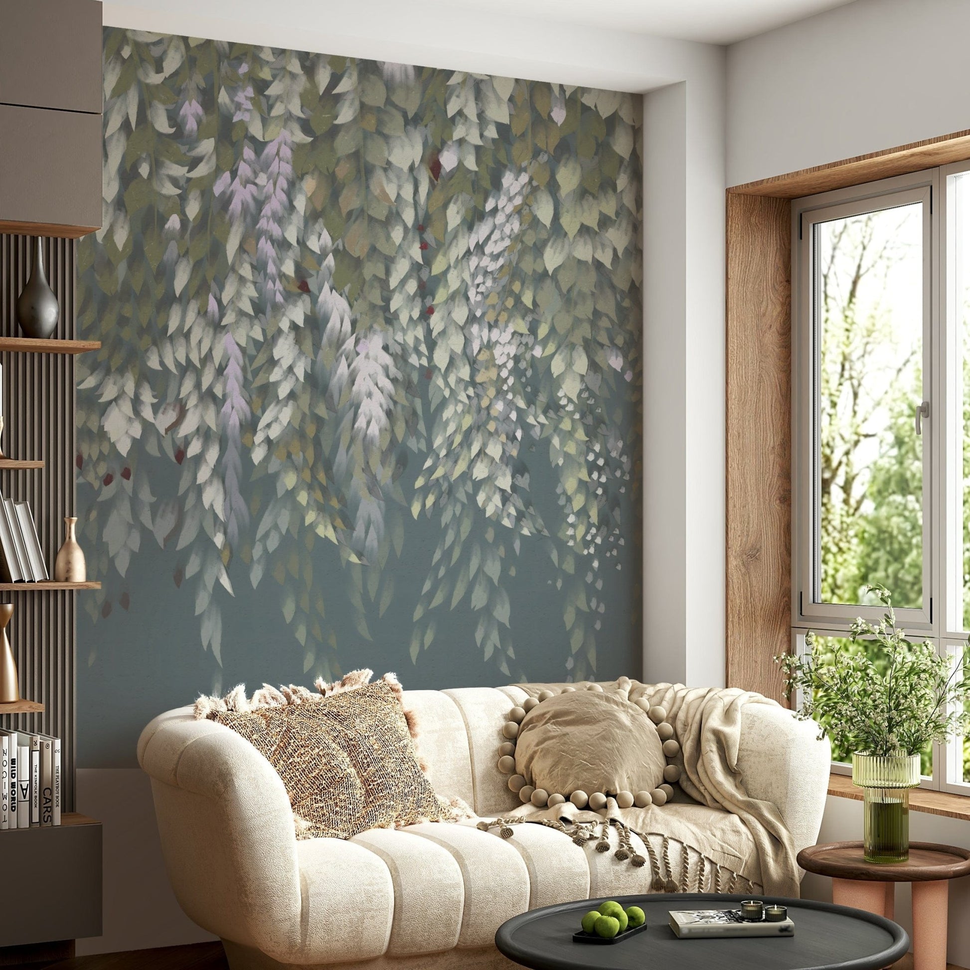 Cascading Wisteria Dream wall mural of green leaves and lilac blooms behind a cream sofa in a living room