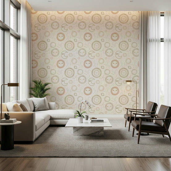 Celestial Harmony wallpaper with gold sun and moon faces behind a cream sectional and leather armchairs