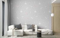 Forest Animals Gray wallpaper behind a white modular sofa and black round coffee table in a grey living room