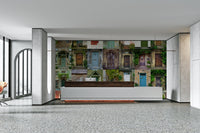 The colors are earthy and natural, with dominant greens, browns, and soft light.

