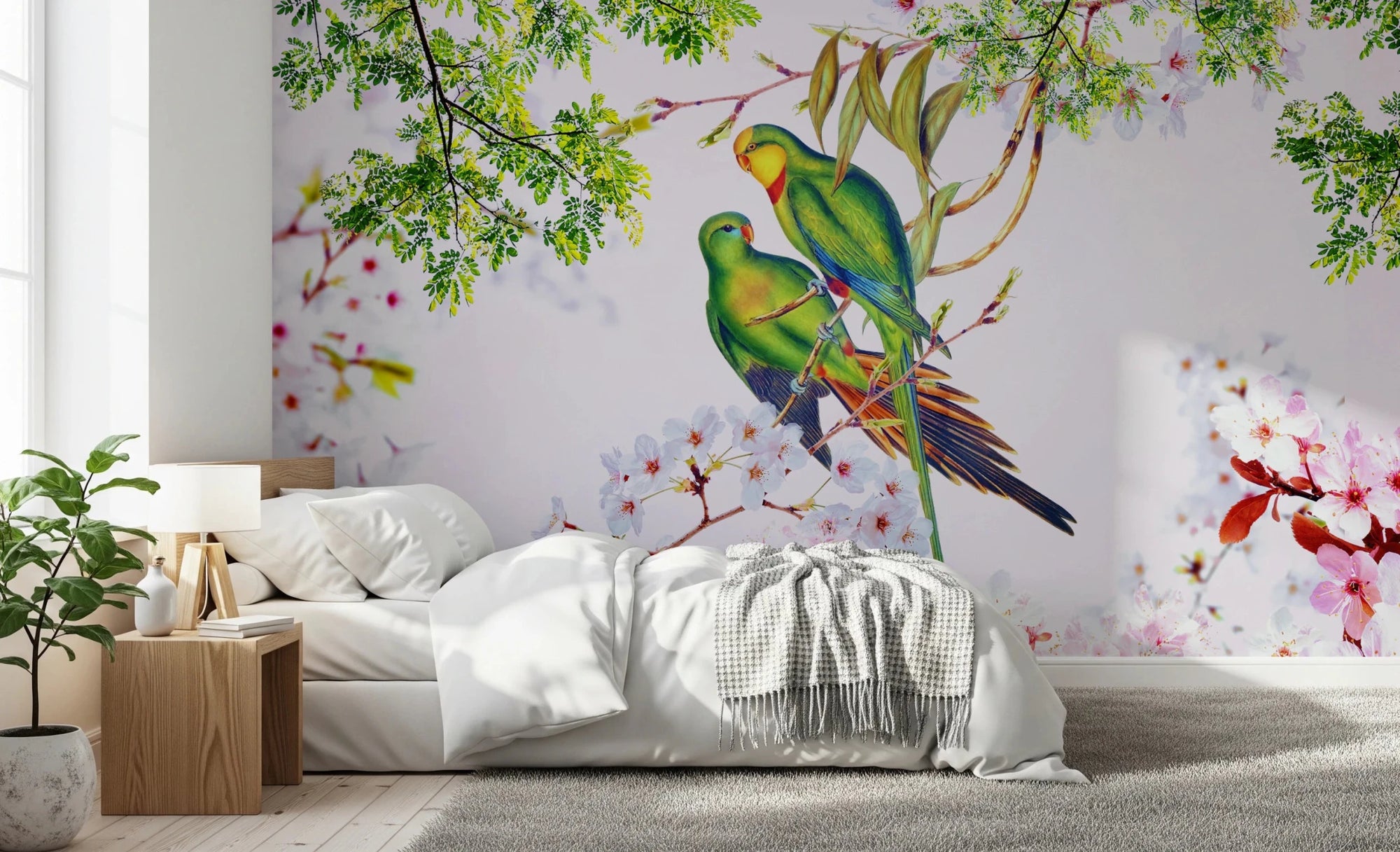 Cherry Blossom Parrots wallpaper mural with two green parrots and pink blossoms above a white bed