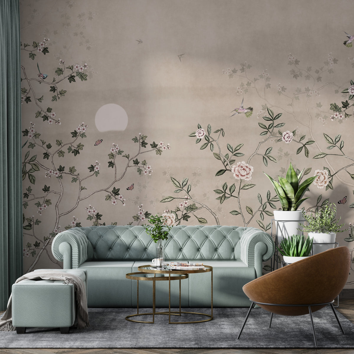 Chinoiserie Floral Botanical wallpaper mural with pink roses and birds behind a sage-green tufted sofa in a living room
