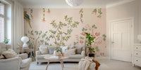 Chinoiserie Garden wallpaper mural with parrots behind a grey sofa with a fiddle-leaf plant and drinks cart