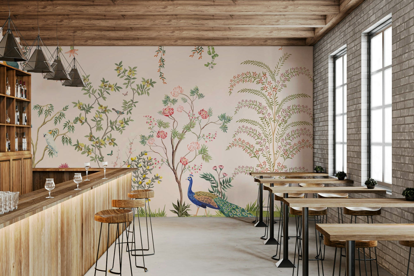Chinoiserie Garden wallpaper mural with a peacock in a cafe with a wood bar, stools and exposed brick wall