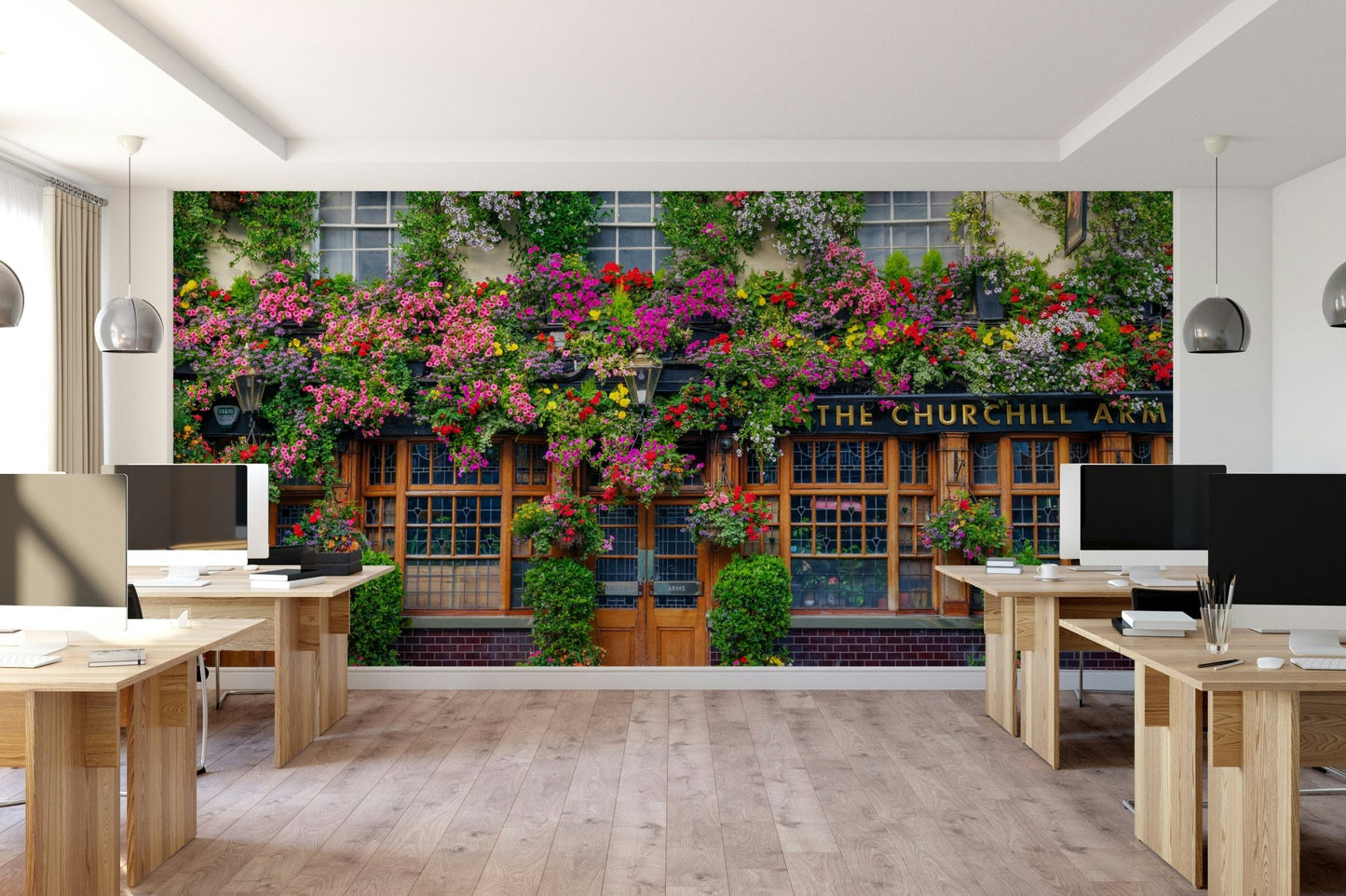 Vibrant flower mural wallpaper covering a pub facade

